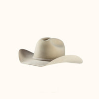 Beige cowboy hat on a white background