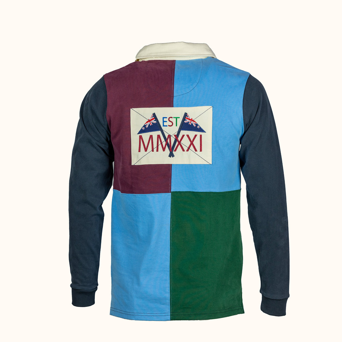 Color-blocked long-sleeve shirt with a visible brand label on a white background