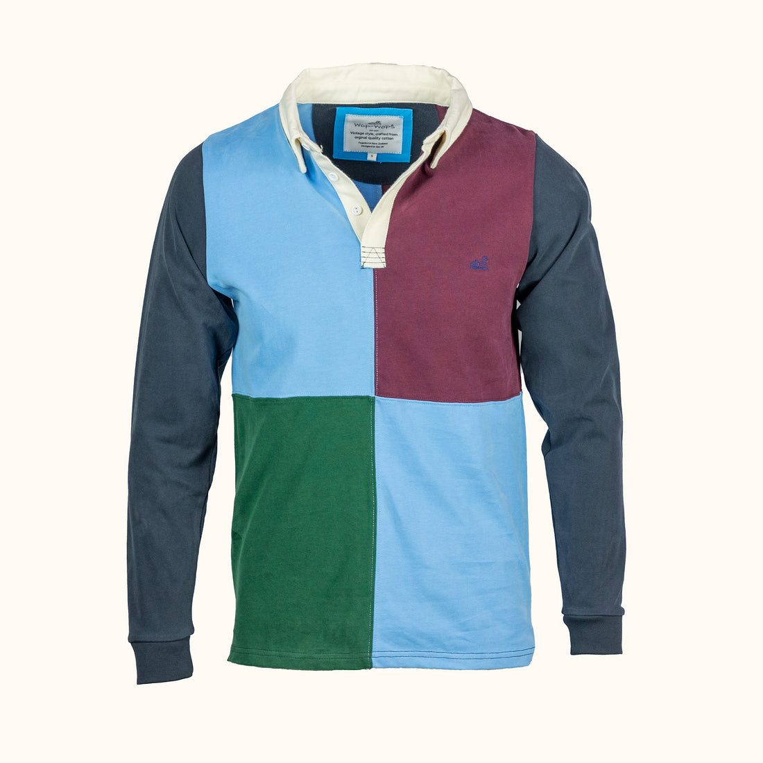 Color-blocked long-sleeve shirt with a visible brand label on a white background