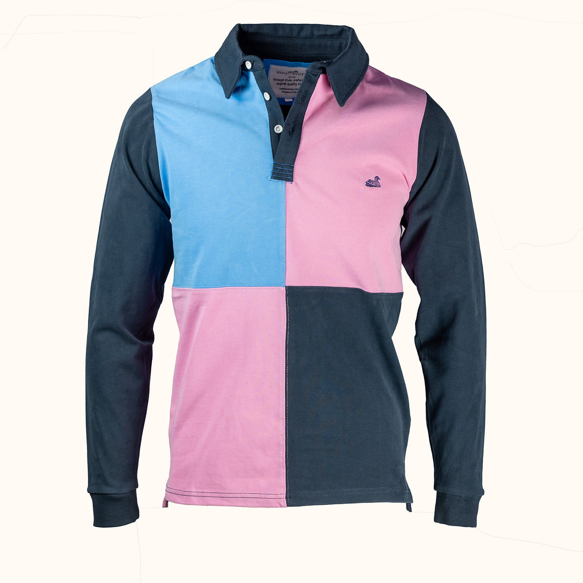 Color-blocked long-sleeve rugby shirt with blue, pink, and navy sections on a white background.