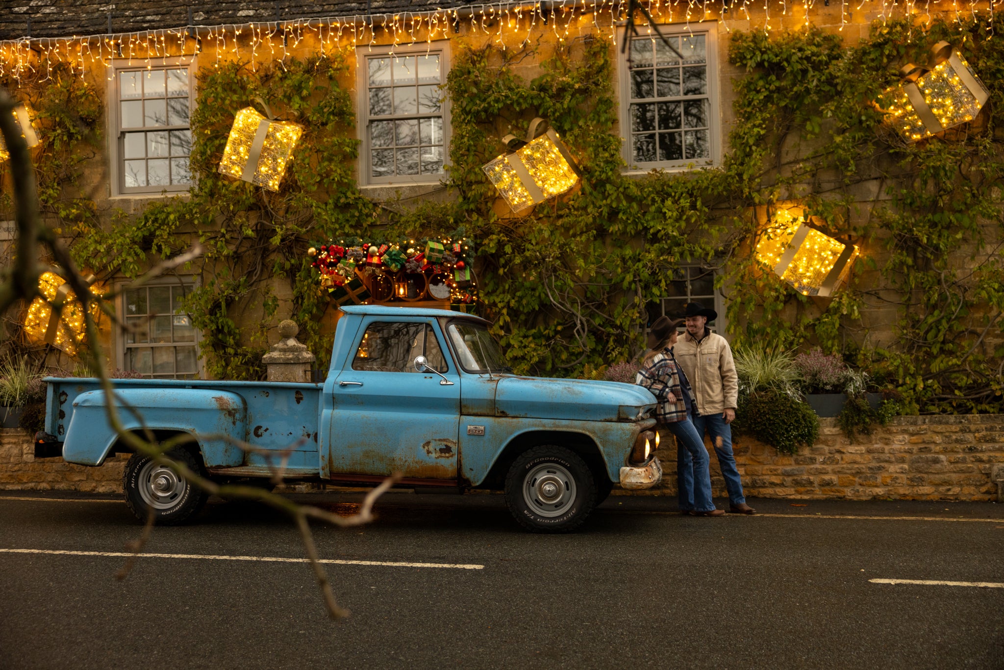 Vintage Chevrolet with western couple in broadway